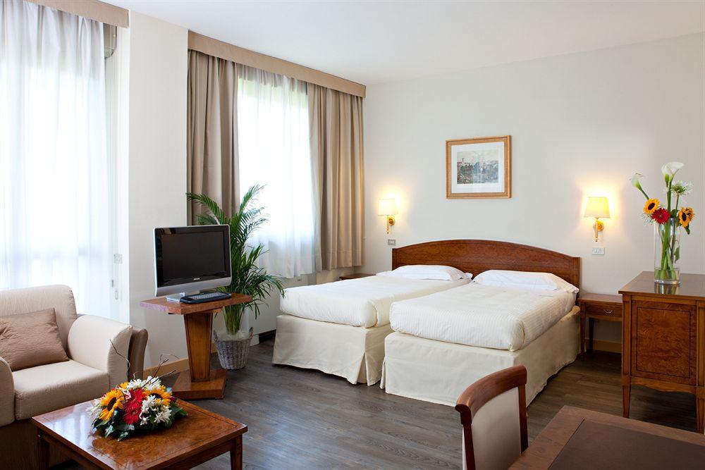 Atahotel Quark Milão Quarto foto